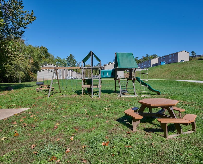 Hidden Brook Apartments and Townhomes Playground and Park Bench Detail